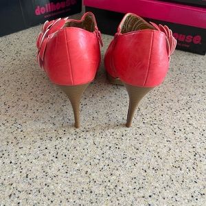 Red ankle boot with flower detail